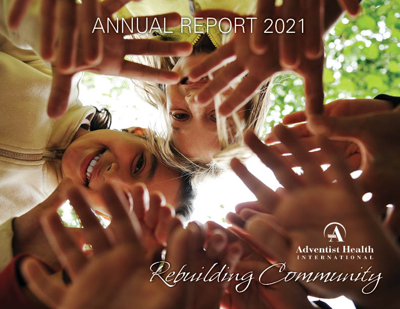AHI Annual Report 2021 Cover - kids holding out their hands