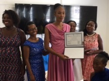 Woman getting certificate for training