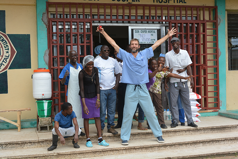 people in front of hospital in West Africa